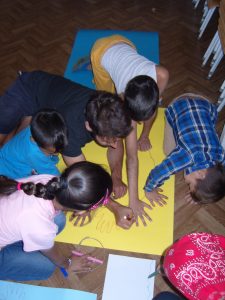 BABs drawing kids hands in Bosnia